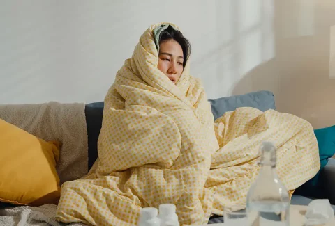 Woman seeking immune support for cold and flu